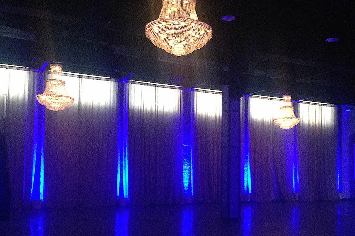 Dramatic blue venue uplighting by YJDecorating